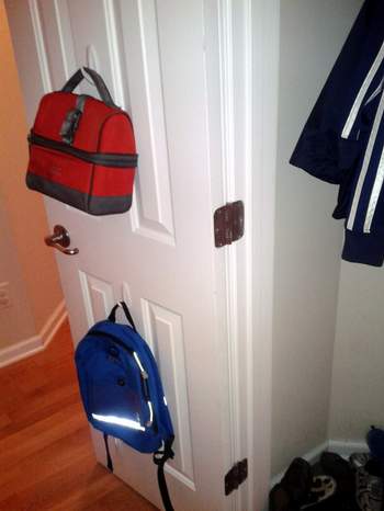 06 mudroom in a closet hooks before