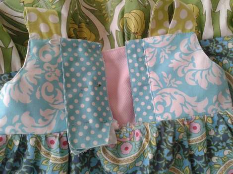 dress inserting button back