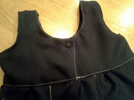 DIY navy and white cheer uniform back button closure