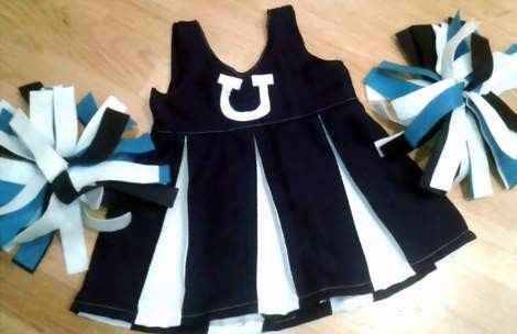 DIY navy and white cheer uniform with pom poms